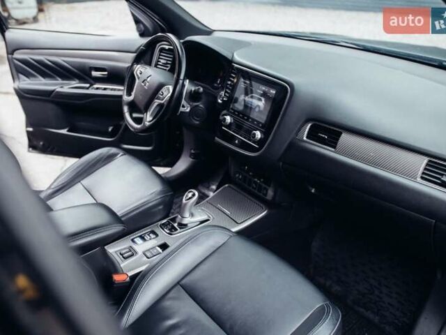 Черный Мицубиси Аутлендер, объемом двигателя 2.36 л и пробегом 110 тыс. км за 28900 $, фото 11 на Automoto.ua