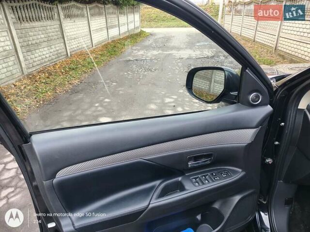 Черный Мицубиси Аутлендер, объемом двигателя 2.36 л и пробегом 50 тыс. км за 21000 $, фото 10 на Automoto.ua