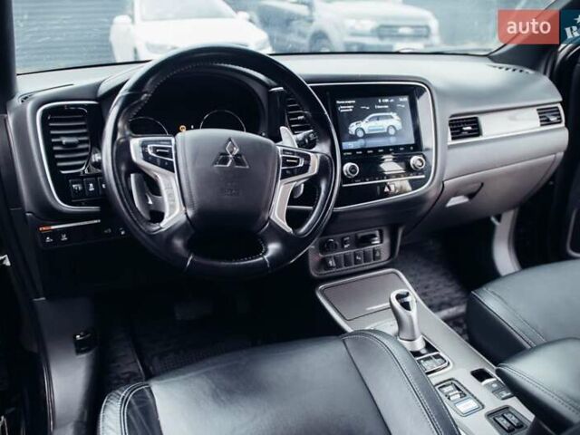Черный Мицубиси Аутлендер, объемом двигателя 2.36 л и пробегом 110 тыс. км за 28900 $, фото 16 на Automoto.ua