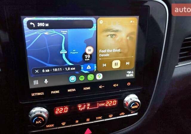 Черный Мицубиси Аутлендер, объемом двигателя 2.36 л и пробегом 110 тыс. км за 28900 $, фото 3 на Automoto.ua