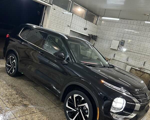 Черный Мицубиси Аутлендер, объемом двигателя 2.5 л и пробегом 64 тыс. км за 25600 $, фото 4 на Automoto.ua