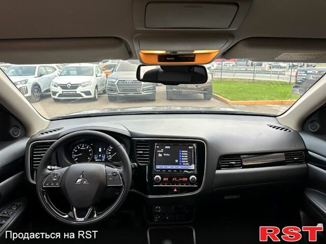 Чорний Міцубісі Аутлендер, об'ємом двигуна 2.5 л та пробігом 132 тис. км за 18140 $, фото 9 на Automoto.ua