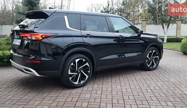 Черный Мицубиси Аутлендер, объемом двигателя 2.5 л и пробегом 69 тыс. км за 24500 $, фото 1 на Automoto.ua