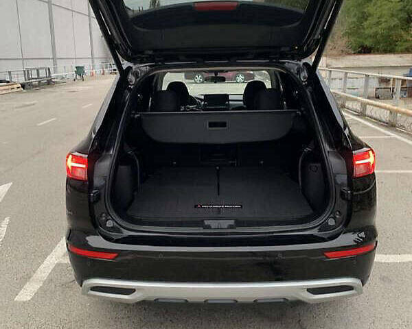 Черный Мицубиси Аутлендер, объемом двигателя 2.49 л и пробегом 70 тыс. км за 21000 $, фото 8 на Automoto.ua