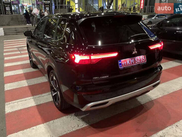 Черный Мицубиси Аутлендер, объемом двигателя 2.49 л и пробегом 70 тыс. км за 21000 $, фото 4 на Automoto.ua