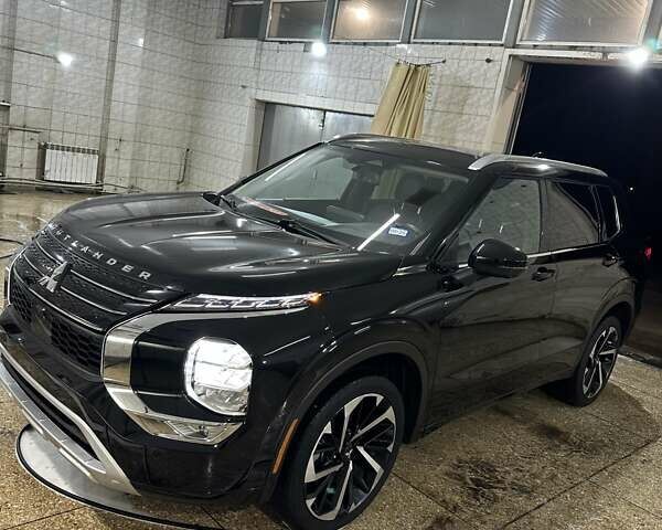 Черный Мицубиси Аутлендер, объемом двигателя 2.5 л и пробегом 64 тыс. км за 25600 $, фото 1 на Automoto.ua
