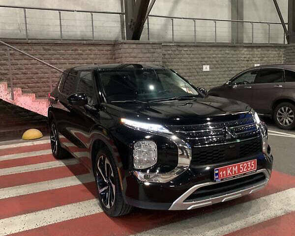 Черный Мицубиси Аутлендер, объемом двигателя 2.49 л и пробегом 70 тыс. км за 21000 $, фото 3 на Automoto.ua