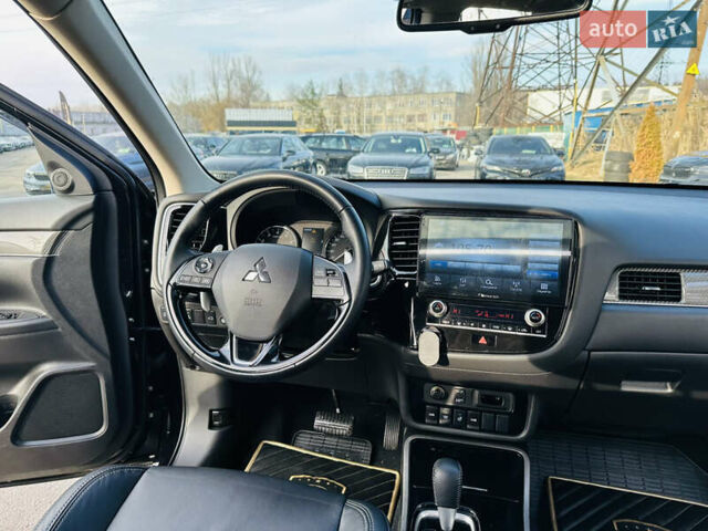 Черный Мицубиси Аутлендер, объемом двигателя 2.36 л и пробегом 64 тыс. км за 29900 $, фото 21 на Automoto.ua