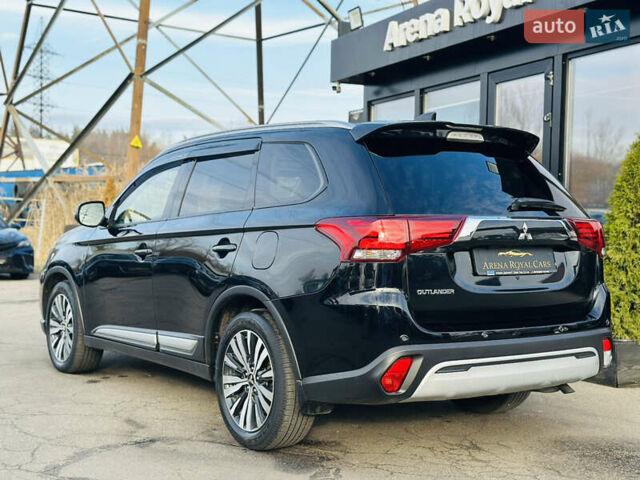 Черный Мицубиси Аутлендер, объемом двигателя 2.36 л и пробегом 64 тыс. км за 29900 $, фото 13 на Automoto.ua