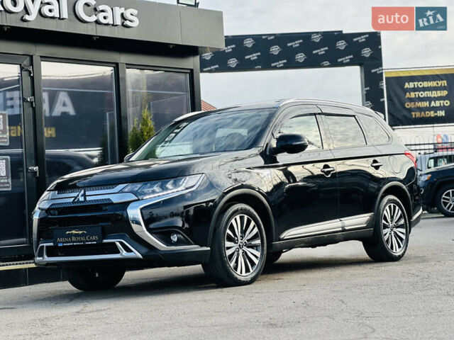 Черный Мицубиси Аутлендер, объемом двигателя 2.36 л и пробегом 64 тыс. км за 29900 $, фото 5 на Automoto.ua