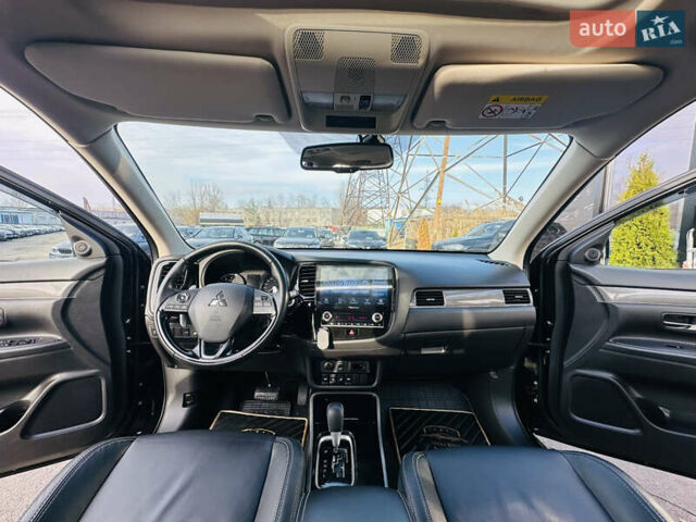 Черный Мицубиси Аутлендер, объемом двигателя 2.36 л и пробегом 64 тыс. км за 29900 $, фото 20 на Automoto.ua