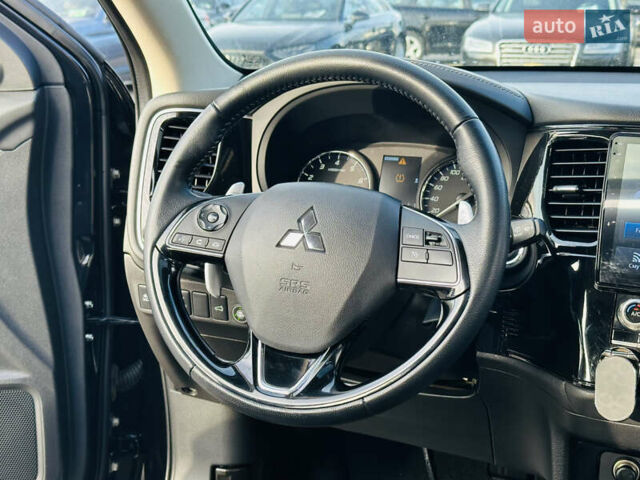 Черный Мицубиси Аутлендер, объемом двигателя 2.36 л и пробегом 64 тыс. км за 29900 $, фото 22 на Automoto.ua