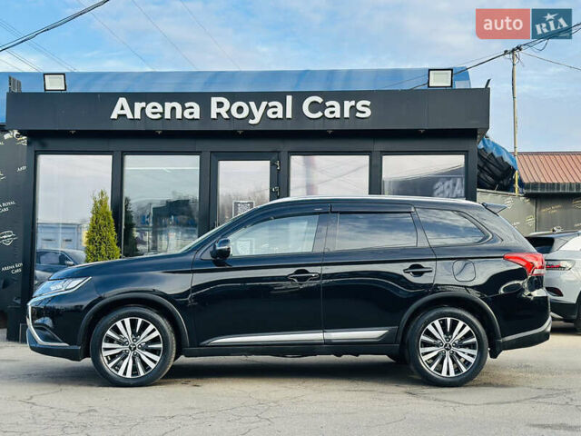 Черный Мицубиси Аутлендер, объемом двигателя 2.36 л и пробегом 64 тыс. км за 29900 $, фото 4 на Automoto.ua