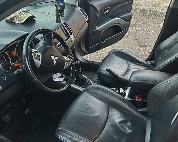 Коричневий Міцубісі Аутлендер, об'ємом двигуна 1.97 л та пробігом 290 тис. км за 8200 $, фото 8 на Automoto.ua