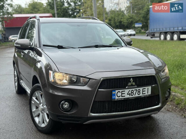 Коричневий Міцубісі Аутлендер, об'ємом двигуна 2.36 л та пробігом 200 тис. км за 9150 $, фото 2 на Automoto.ua
