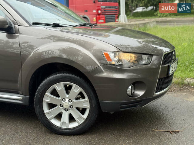 Коричневий Міцубісі Аутлендер, об'ємом двигуна 2.36 л та пробігом 200 тис. км за 9150 $, фото 4 на Automoto.ua