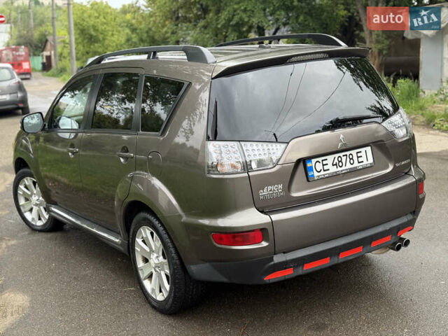 Коричневий Міцубісі Аутлендер, об'ємом двигуна 2.36 л та пробігом 200 тис. км за 9150 $, фото 7 на Automoto.ua
