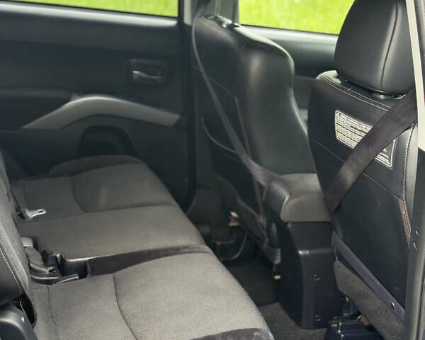 Коричневий Міцубісі Аутлендер, об'ємом двигуна 2.36 л та пробігом 200 тис. км за 9150 $, фото 12 на Automoto.ua