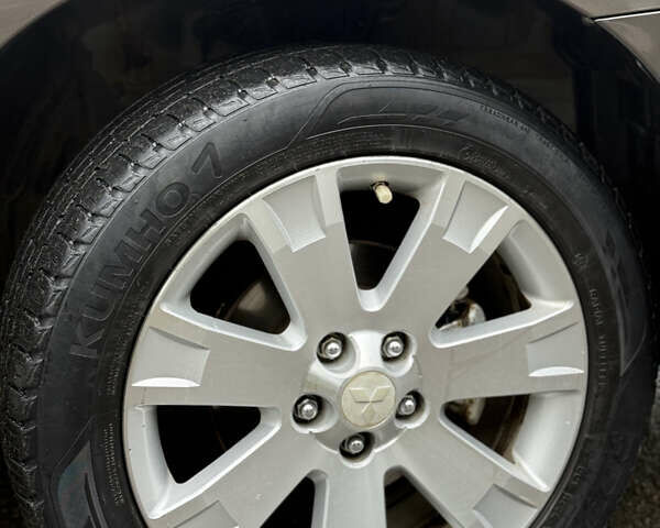 Коричневий Міцубісі Аутлендер, об'ємом двигуна 2.36 л та пробігом 200 тис. км за 9150 $, фото 15 на Automoto.ua