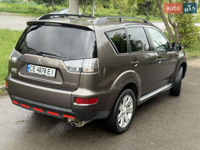 Коричневий Міцубісі Аутлендер, об'ємом двигуна 2.36 л та пробігом 200 тис. км за 9150 $, фото 6 на Automoto.ua