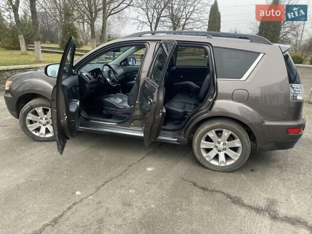 Коричневий Міцубісі Аутлендер, об'ємом двигуна 2.2 л та пробігом 266 тис. км за 11000 $, фото 7 на Automoto.ua