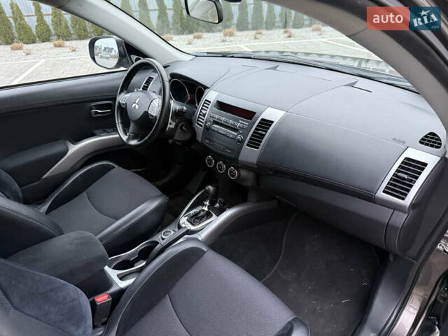 Коричневий Міцубісі Аутлендер, об'ємом двигуна 2.2 л та пробігом 235 тис. км за 10600 $, фото 33 на Automoto.ua