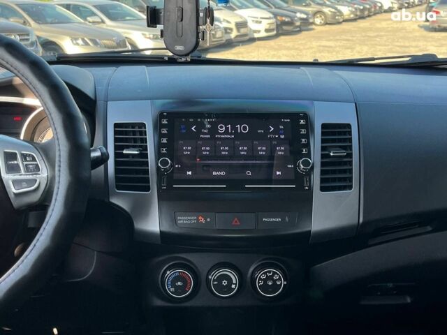 Мицубиси Аутлендер 2010 в Львове на Automoto.ua Коричневый Мицубиси Аутлендер, объемом двигателя 2.4 л и пробегом 303 тыс. км за 8990 $, фото 13 на Automoto.ua