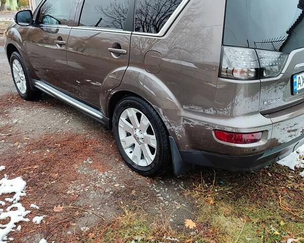 Коричневый Мицубиси Аутлендер, объемом двигателя 2.2 л и пробегом 210 тыс. км за 11500 $, фото 5 на Automoto.ua