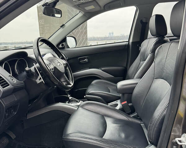 Коричневый Мицубиси Аутлендер, объемом двигателя 2.18 л и пробегом 208 тыс. км за 10555 $, фото 13 на Automoto.ua