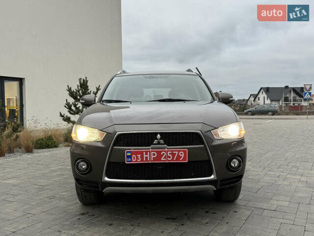 Коричневий Міцубісі Аутлендер, об'ємом двигуна 2.2 л та пробігом 235 тис. км за 10600 $, фото 2 на Automoto.ua