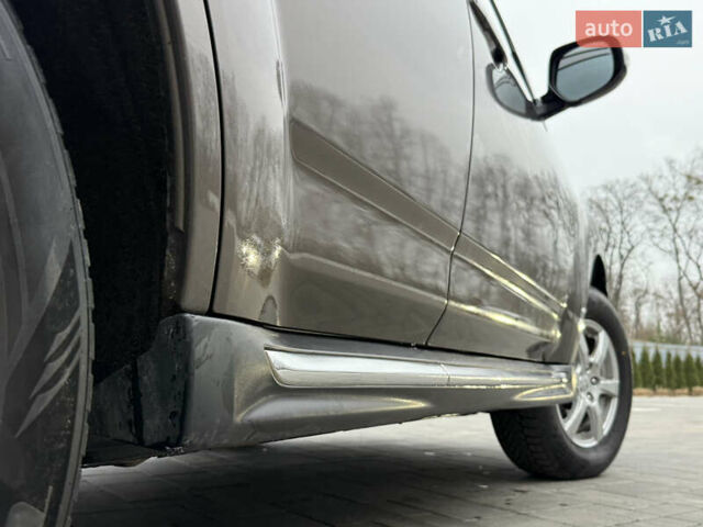 Коричневий Міцубісі Аутлендер, об'ємом двигуна 2.2 л та пробігом 235 тис. км за 10600 $, фото 16 на Automoto.ua