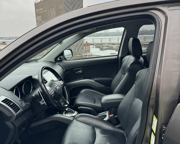 Коричневый Мицубиси Аутлендер, объемом двигателя 2.18 л и пробегом 208 тыс. км за 10555 $, фото 42 на Automoto.ua