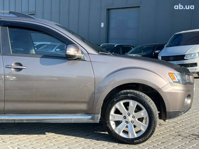 Мицубиси Аутлендер 2010 в Львове на Automoto.ua Коричневый Мицубиси Аутлендер, объемом двигателя 2.4 л и пробегом 303 тыс. км за 8990 $, фото 43 на Automoto.ua