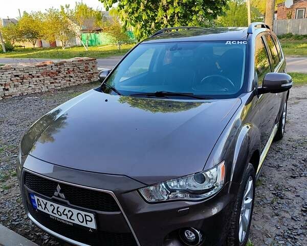Коричневый Мицубиси Аутлендер, объемом двигателя 2.2 л и пробегом 210 тыс. км за 11500 $, фото 1 на Automoto.ua