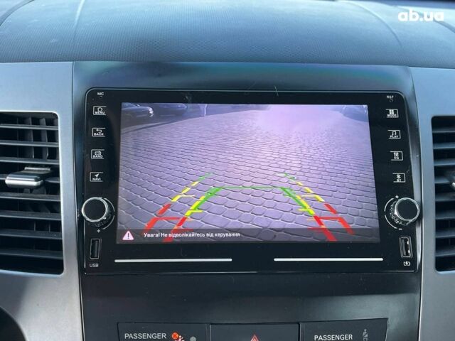 Мицубиси Аутлендер 2010 в Львове на Automoto.ua Коричневый Мицубиси Аутлендер, объемом двигателя 2.4 л и пробегом 303 тыс. км за 8990 $, фото 21 на Automoto.ua