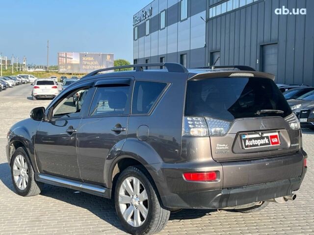 Мицубиси Аутлендер 2010 в Львове на Automoto.ua Коричневый Мицубиси Аутлендер, объемом двигателя 2.4 л и пробегом 303 тыс. км за 8990 $, фото 38 на Automoto.ua