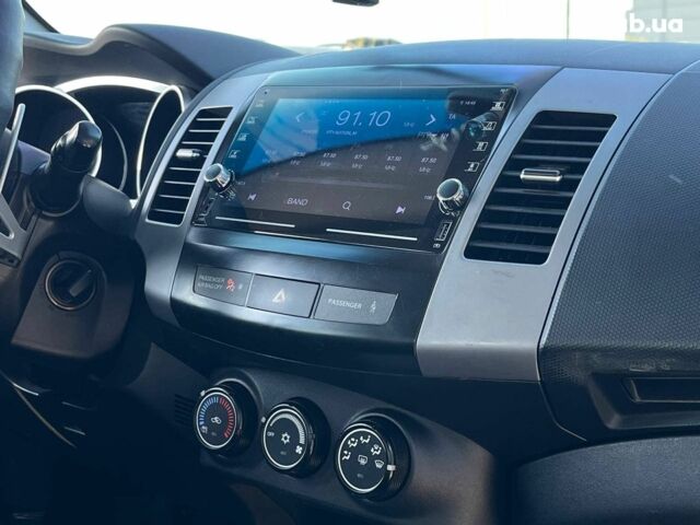 Мицубиси Аутлендер 2010 в Львове на Automoto.ua Коричневый Мицубиси Аутлендер, объемом двигателя 2.4 л и пробегом 303 тыс. км за 8990 $, фото 6 на Automoto.ua