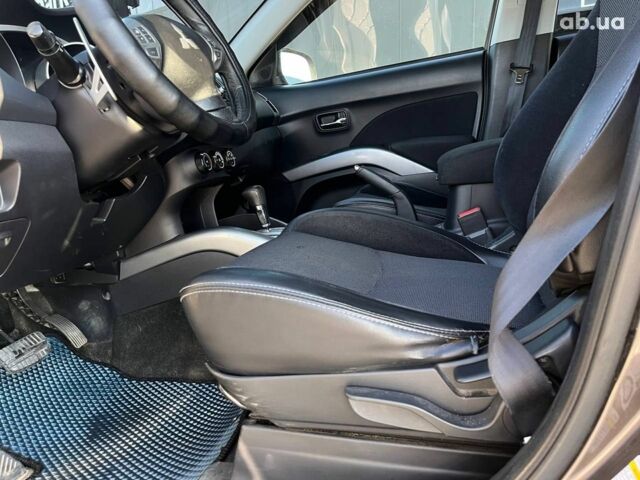 Мицубиси Аутлендер 2010 в Львове на Automoto.ua Коричневый Мицубиси Аутлендер, объемом двигателя 2.4 л и пробегом 303 тыс. км за 8990 $, фото 31 на Automoto.ua