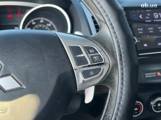 Мицубиси Аутлендер 2010 в Львове на Automoto.ua Коричневый Мицубиси Аутлендер, объемом двигателя 2.4 л и пробегом 303 тыс. км за 8990 $, фото 23 на Automoto.ua