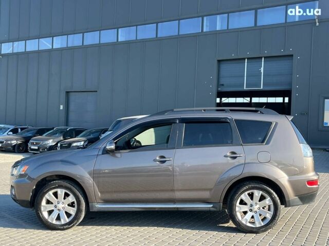 Мицубиси Аутлендер 2010 в Львове на Automoto.ua Коричневый Мицубиси Аутлендер, объемом двигателя 2.4 л и пробегом 303 тыс. км за 8990 $, фото 36 на Automoto.ua