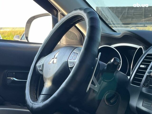 Мицубиси Аутлендер 2010 в Львове на Automoto.ua Коричневый Мицубиси Аутлендер, объемом двигателя 2.4 л и пробегом 303 тыс. км за 8990 $, фото 5 на Automoto.ua