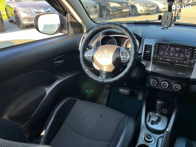 Мицубиси Аутлендер 2010 в Львове на Automoto.ua Коричневый Мицубиси Аутлендер, объемом двигателя 2.4 л и пробегом 303 тыс. км за 8990 $, фото 15 на Automoto.ua