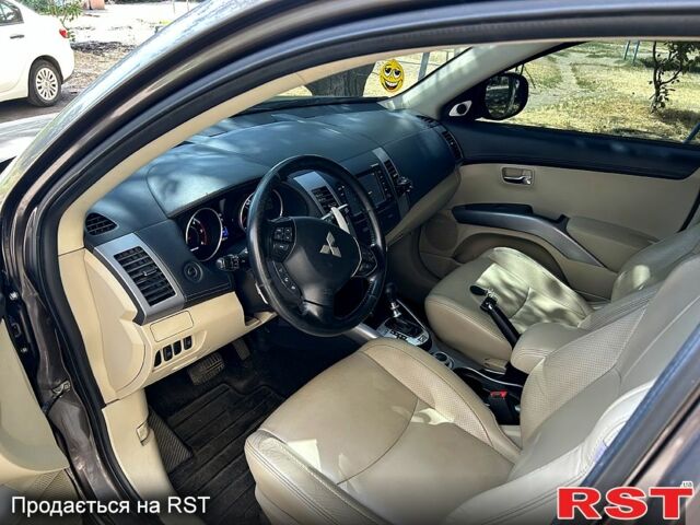 Коричневый Мицубиси Аутлендер, объемом двигателя 2.2 л и пробегом 281 тыс. км за 11250 $, фото 6 на Automoto.ua