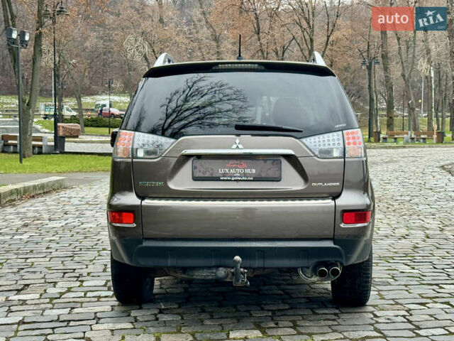 Коричневый Мицубиси Аутлендер, объемом двигателя 2.18 л и пробегом 208 тыс. км за 10555 $, фото 7 на Automoto.ua