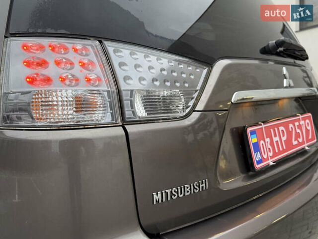 Коричневий Міцубісі Аутлендер, об'ємом двигуна 2.2 л та пробігом 235 тис. км за 10600 $, фото 9 на Automoto.ua