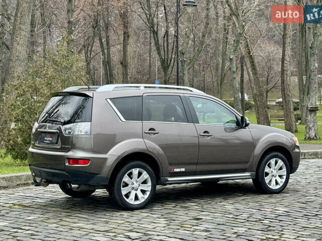Коричневый Мицубиси Аутлендер, объемом двигателя 2.18 л и пробегом 208 тыс. км за 10555 $, фото 5 на Automoto.ua