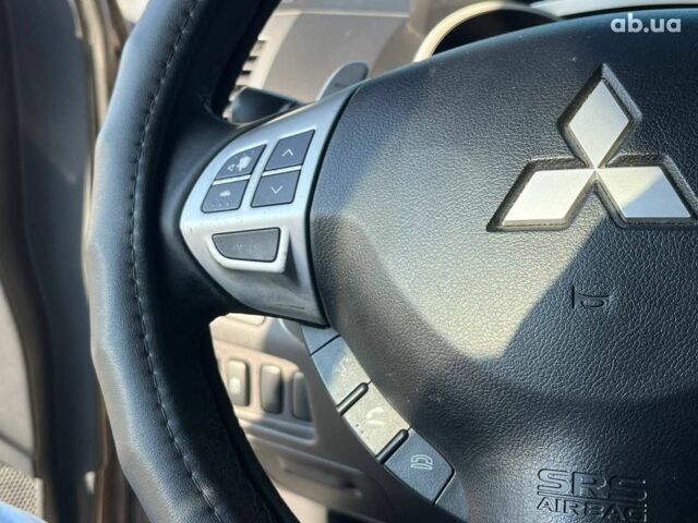 Мицубиси Аутлендер 2010 в Львове на Automoto.ua Коричневый Мицубиси Аутлендер, объемом двигателя 2.4 л и пробегом 303 тыс. км за 8990 $, фото 22 на Automoto.ua