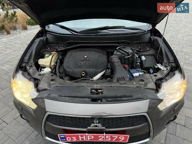 Коричневий Міцубісі Аутлендер, об'ємом двигуна 2.2 л та пробігом 235 тис. км за 10600 $, фото 54 на Automoto.ua