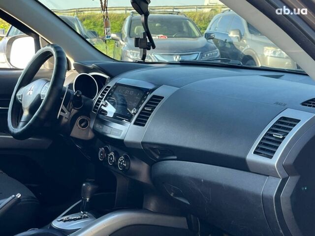 Мицубиси Аутлендер 2010 в Львове на Automoto.ua Коричневый Мицубиси Аутлендер, объемом двигателя 2.4 л и пробегом 303 тыс. км за 8990 $, фото 9 на Automoto.ua