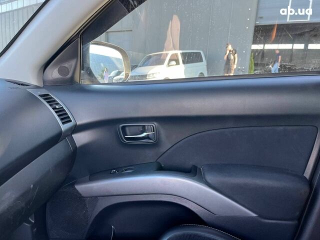 Мицубиси Аутлендер 2010 в Львове на Automoto.ua Коричневый Мицубиси Аутлендер, объемом двигателя 2.4 л и пробегом 303 тыс. км за 8990 $, фото 20 на Automoto.ua